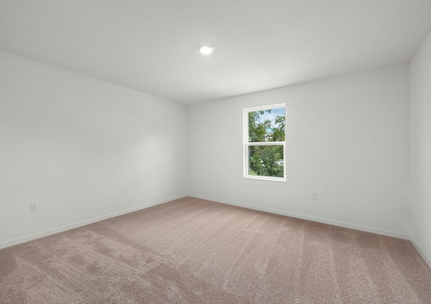 Each bedroom features lush carpet flooring