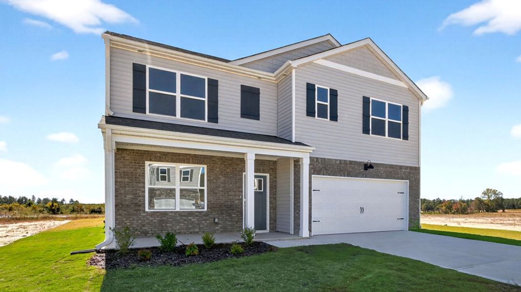 Front exterior of a new home in Martin Farms, Aberdeen, NC, highlighting curb appeal (Image 2). Front exterior of a new home in Martin Farms, Aberdeen, NC, highlighting curb appeal (Image 2).