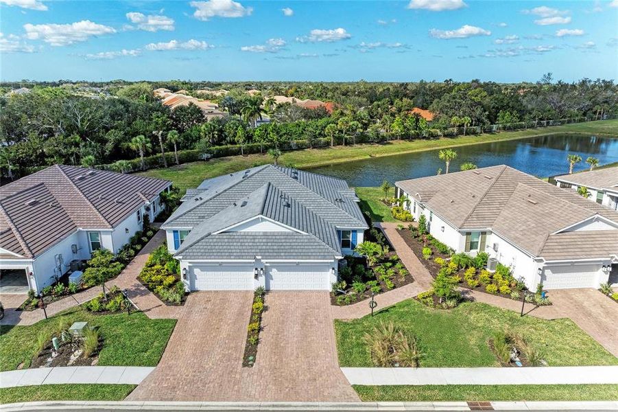 Front exterior of a new home in , Bradenton, FL, highlighting curb appeal (Image 23).
