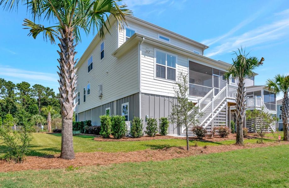 Front exterior of a new home in Liberty Hill Farm, Mount Pleasant, SC, highlighting curb appeal (Image 24).
