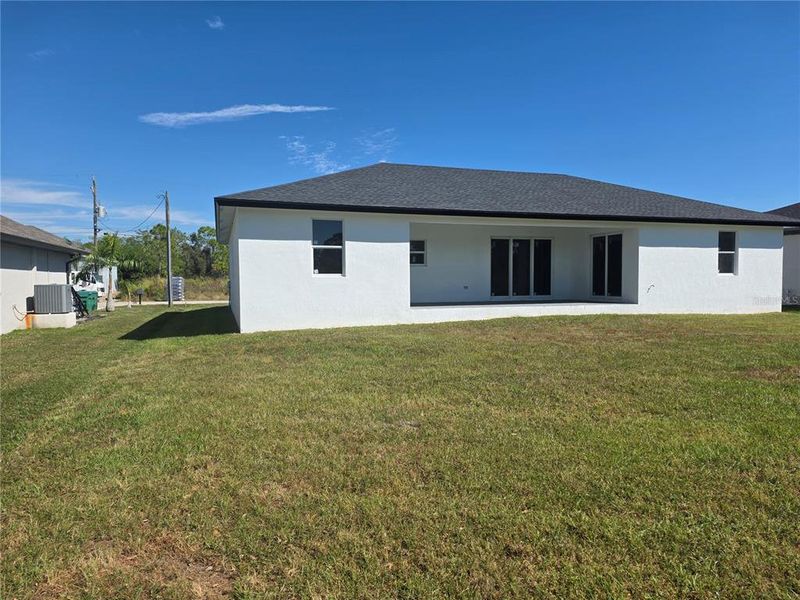 Exterior details and patio area of a home in , Port Charlotte (Image 2).