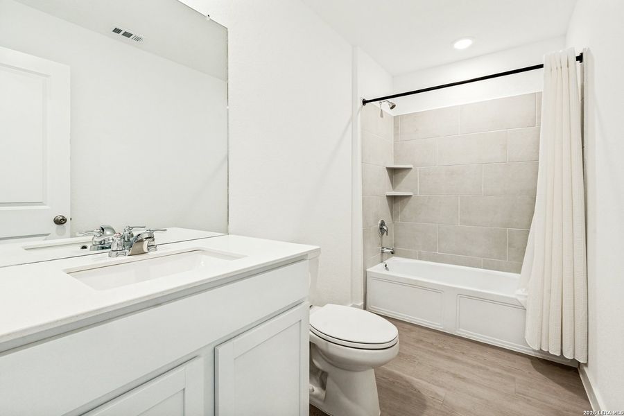 Furnished interior view inside a new home in Hidden Trails, Bulverde (Image 8).