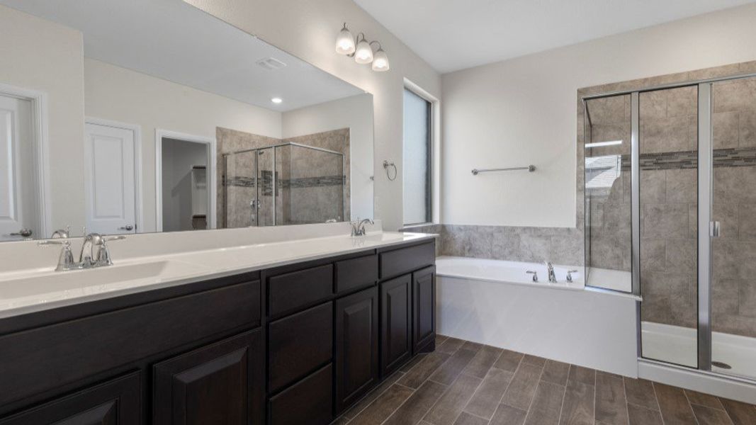 Representative furnished interior of a home built from the Valley Spring by D.R. Horton in Eden Ranch, Arlington (Image 13).