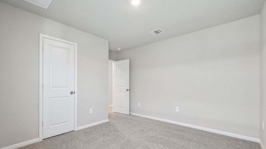 Spacious, unfurnished interior of a new home in Carillon, Manor (Image 33).