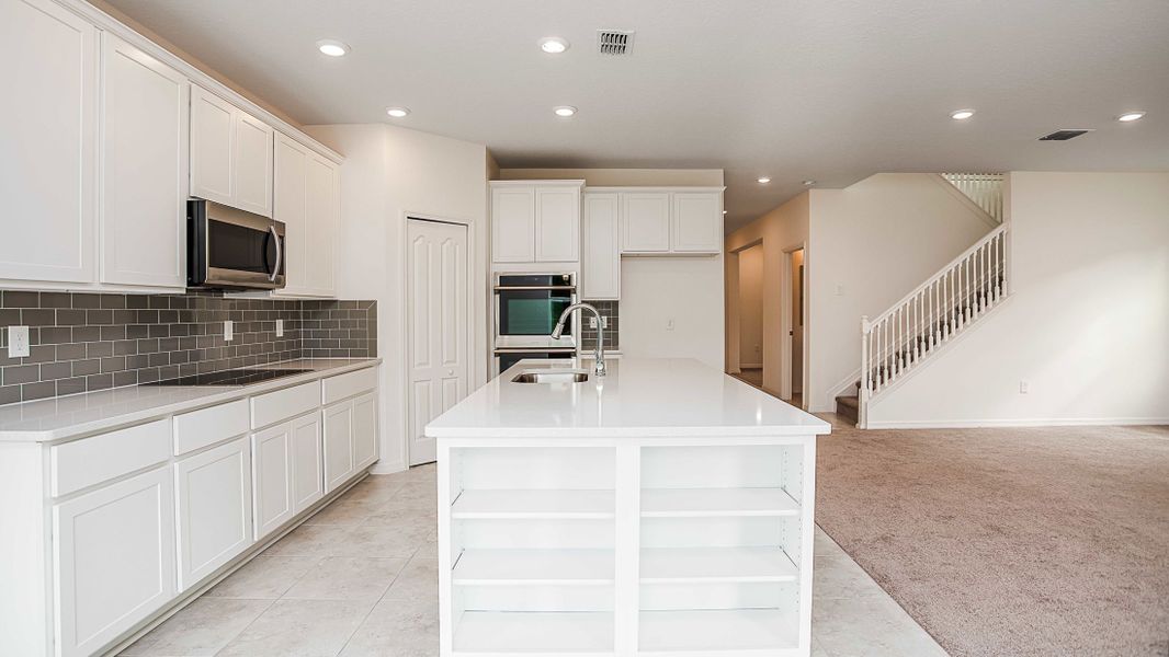 Representative furnished interior of a home built from the Carlisle by Maronda Homes in Malabar Springs, Palm Bay (Image 42).