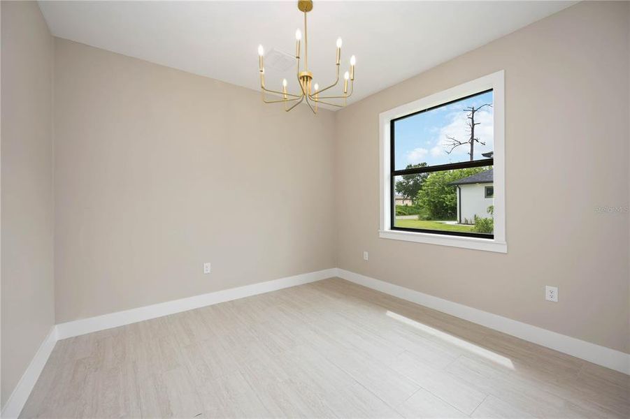 Spacious, unfurnished interior of a new home in , Port Charlotte (Image 38).