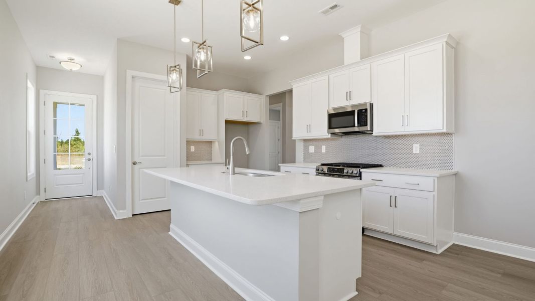 Furnished interior view inside a new home in Cresswind at Rocky River, Locust (Image 3).