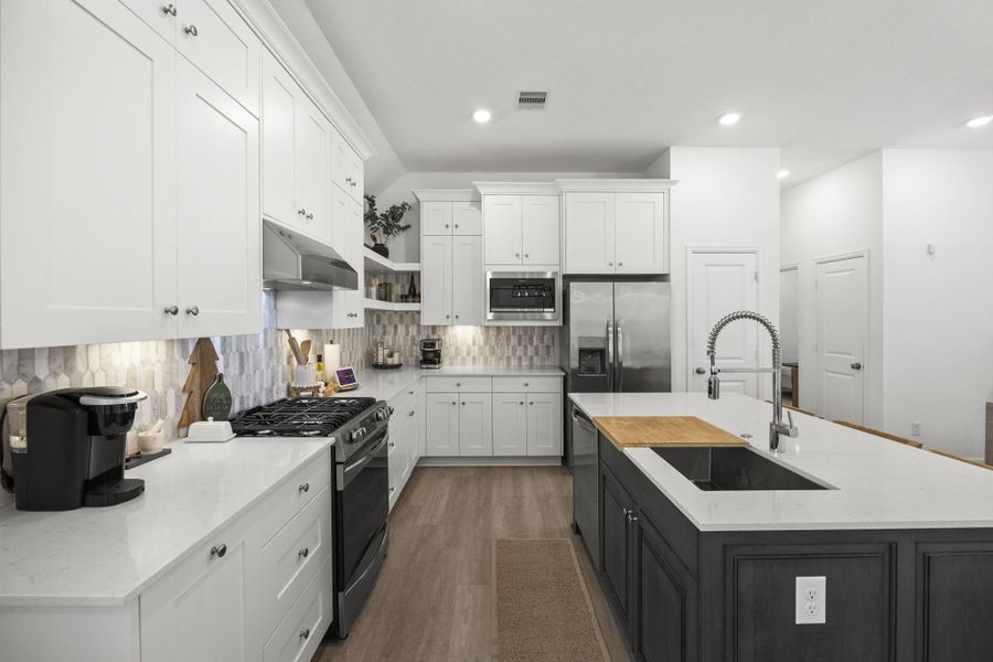 Furnished interior view inside a new home in Sunterra: Avante Collection, Katy (Image 11).