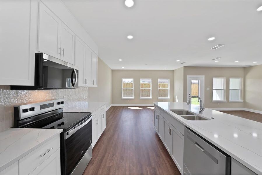 Furnished interior view inside a new home in , The Colony (Image 8).