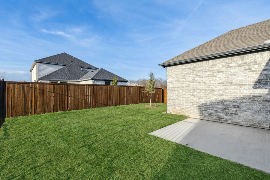 Patio in the Oak II home plan by Trophy Signature Homes – REPRESENTATIVE PHOTO