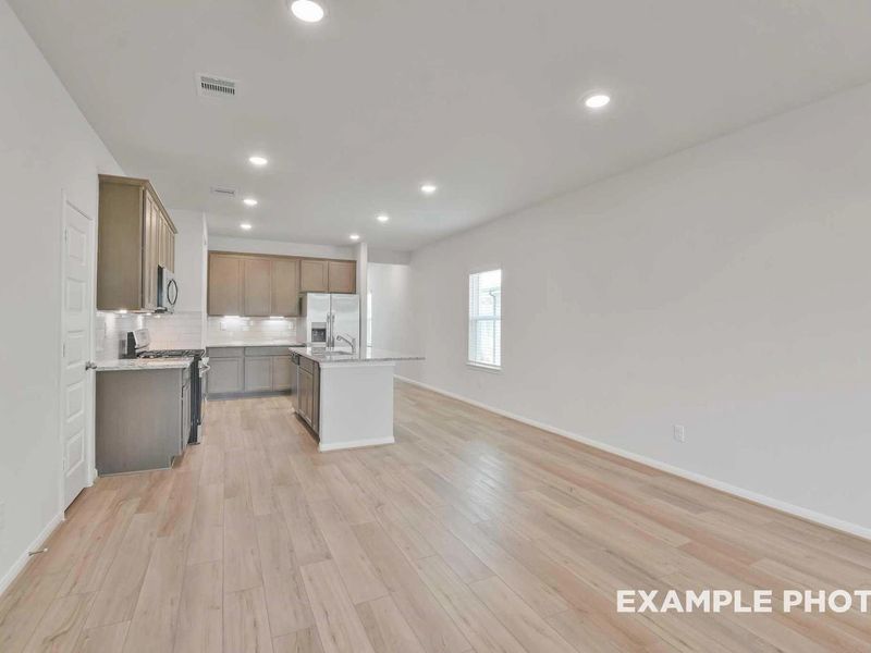 Furnished interior view inside a new home in Caney Creek Place, Conroe (Image 12).