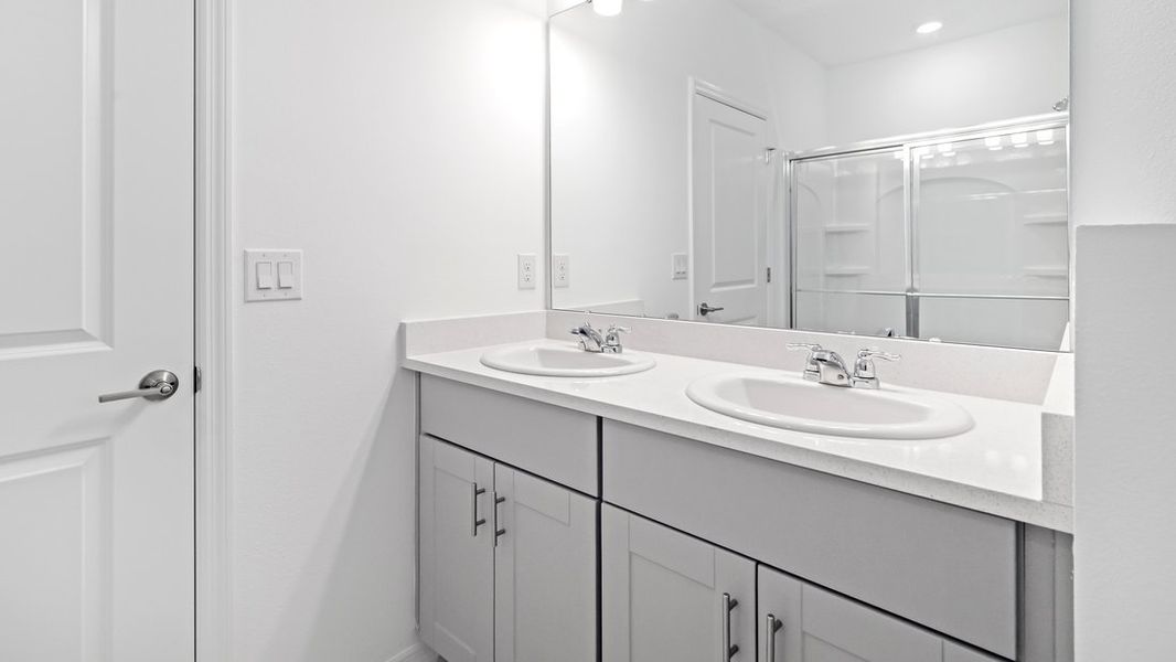 Representative furnished interior of a home built from the Ambrosia by Taylor Morrison in Aden South at Westview, Kissimmee (Image 9).