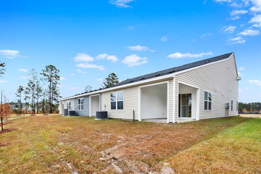 Exterior details and patio area of a home in Cobblestone at East Argent, Hardeeville (Image 16).