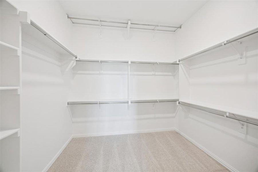 A dream owner's closet with seasonal hanging space is the cherry on top in this dreamy owner's suite! A dream owner's closet with seasonal hanging space is the cherry on top in this dreamy owner's suite!