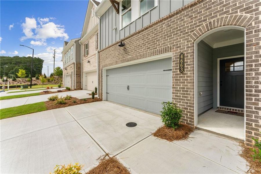 Exterior details and patio area of a home in Wildwood Place, Powder Springs (Image 2). Exterior details and patio area of a home in Wildwood Place, Powder Springs (Image 2).