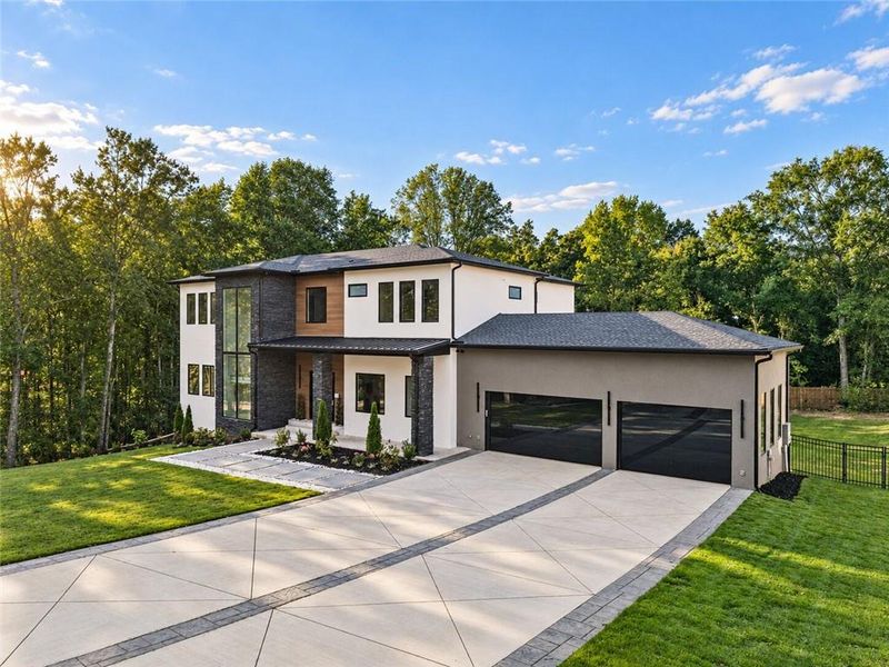 Front exterior of a new home in , Auburn, GA, highlighting curb appeal (Image 29).