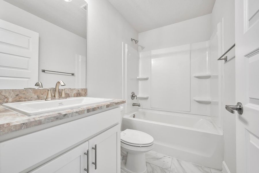 Representative furnished interior of a home built from the 2000 by Adams Homes in Winding Oaks, Weeki Wachee (Image 10).