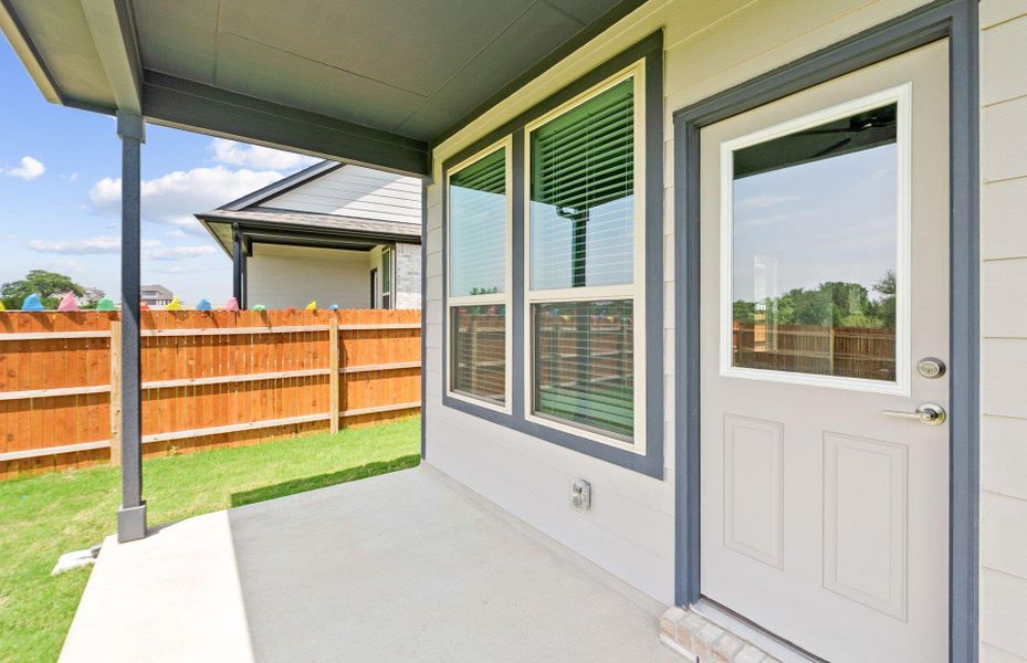 Exterior details and patio area of a home in Saddleback at Santa Rita Ranch, Liberty Hill (Image 18).