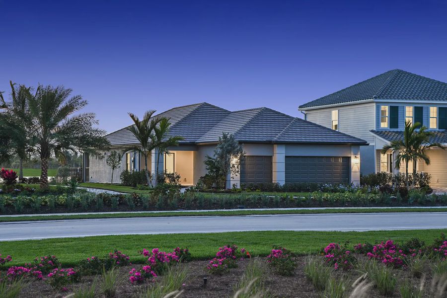 Representative exterior photo of a completed home built from the Meadow Brook by Neal Communities in SkySail, Naples, FL (Image 21).