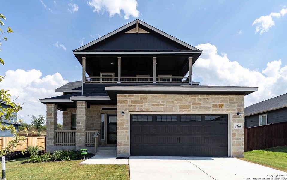 Front exterior of a new home in Homestead, Schertz, TX, highlighting curb appeal (Image 1).