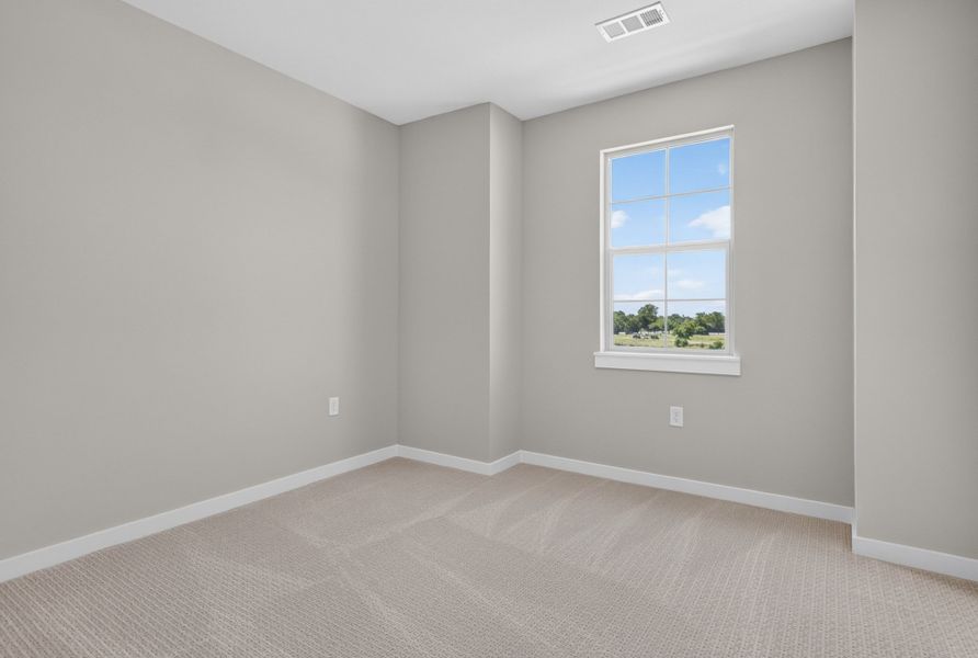 Spacious, unfurnished interior of a new home in The Tribute, The Colony (Image 44).
