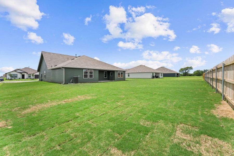Exterior details and patio area of a home in Hartland Ranch, Lockhart (Image 3).