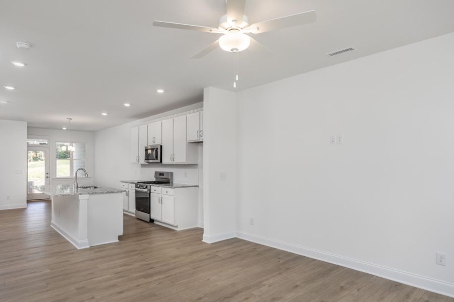Furnished interior view inside a new home in Enclave at Traditions Townhomes, Wake Forest (Image 8).