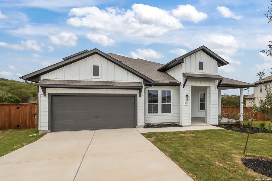 Front exterior of a new home in Homestead, Schertz, TX, highlighting curb appeal (Image 2). Front exterior of a new home in Homestead, Schertz, TX, highlighting curb appeal (Image 2).