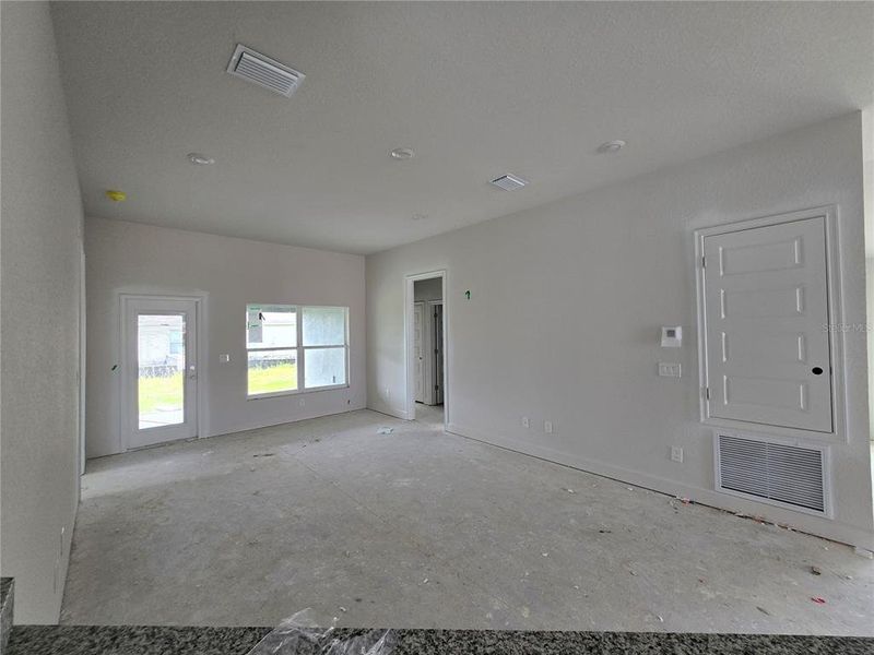 view from breakfast bar to living room