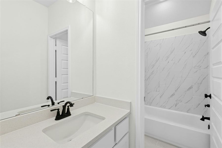 Full bath featuring shower / bath combination and vanity Full bath featuring shower / bath combination and vanity