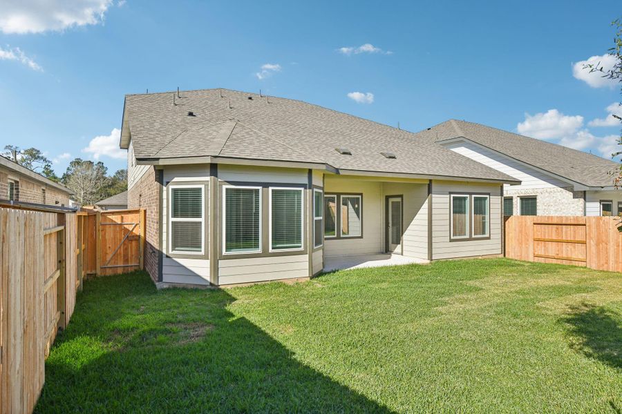 Exterior details and patio area of a home in Stewart's Ranch, Conroe (Image 23). Exterior details and patio area of a home in Stewart's Ranch, Conroe (Image 23).
