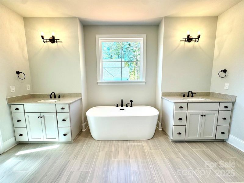 Furnished interior view inside a new home in Saddlehorn, Troutman (Image 8). Furnished interior view inside a new home in Saddlehorn, Troutman (Image 8).