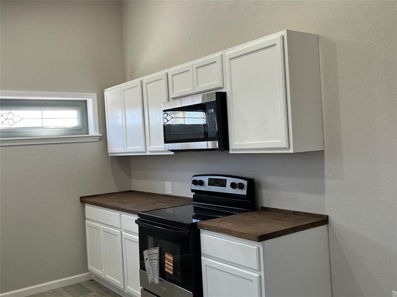 Furnished interior view inside a new home in , Brownwood (Image 5).