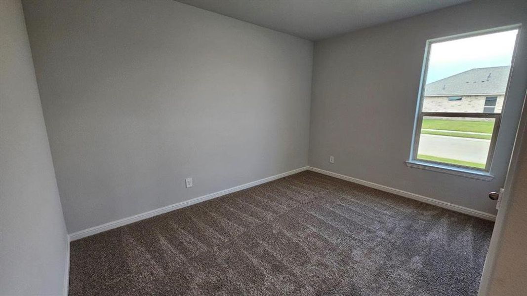 Spacious, unfurnished interior of a new home in Monarch at the Meadows, Ponder (Image 13).