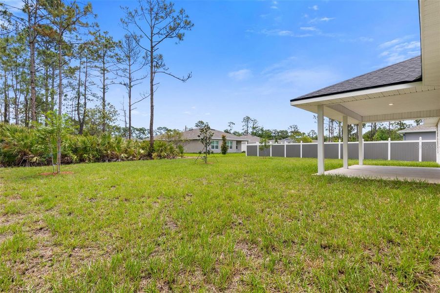 Exterior details and patio area of a home in Palm Coast, Palm Coast (Image 17).