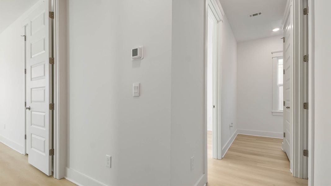 Representative unfurnished interior of a home built from the Trenton by D.R. Horton in Parkside, Santa Rosa Beach (Image 33).