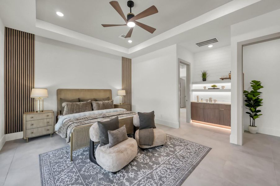 Generously sized and thoughtfully designed, the primary suite offers a peaceful escape with refined finishes and a quiet connection to the natural surroundings.