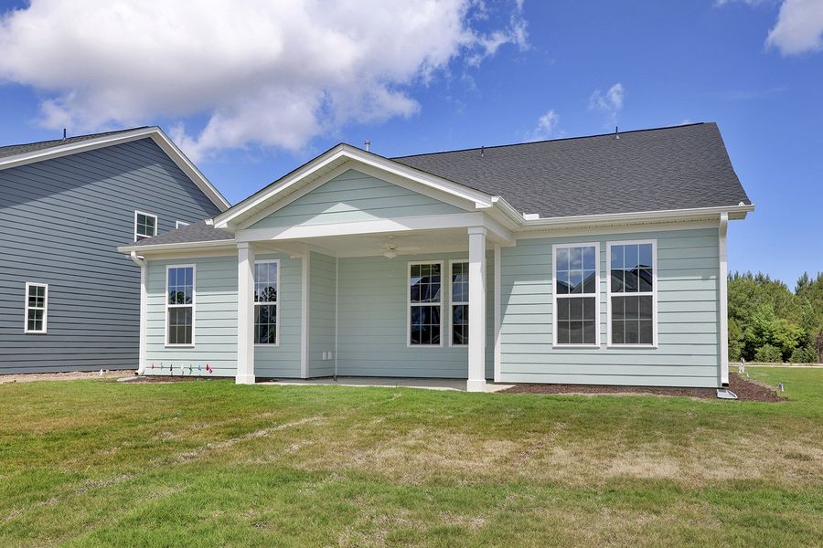 Exterior details and patio area of a home in Grand Park, Leland (Image 19).