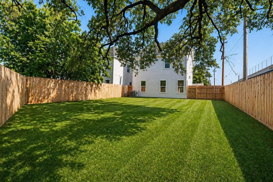 Exterior details and patio area of a home in , Houston (Image 3).