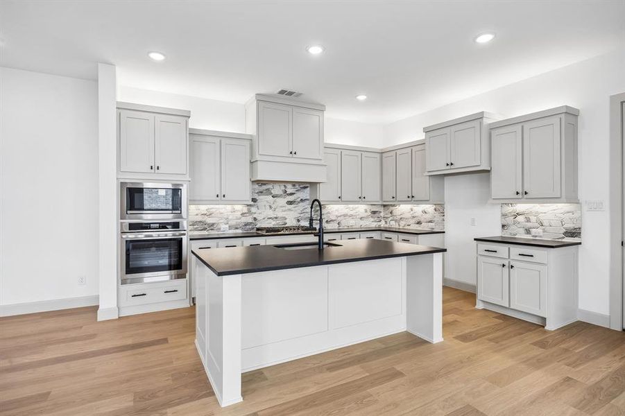 Fantastic storage, outstanding prep space and plenty of style, this dream kitchen is waiting for you to call it your own! Fantastic storage, outstanding prep space and plenty of style, this dream kitchen is waiting for you to call it your own!