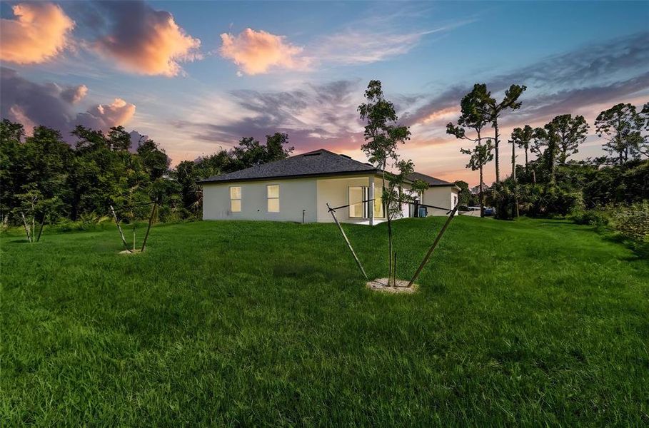 Front exterior of a new home in , North Port, FL, highlighting curb appeal (Image 18).