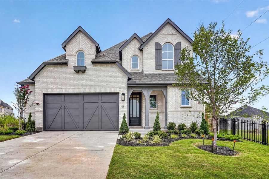 Front exterior of a new home in The Parks at Wilson Creek, Celina, TX, highlighting curb appeal (Image 1). Front exterior of a new home in The Parks at Wilson Creek, Celina, TX, highlighting curb appeal (Image 1).