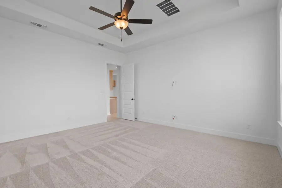 Primary Bedroom with tray ceiling Primary Bedroom with tray ceiling