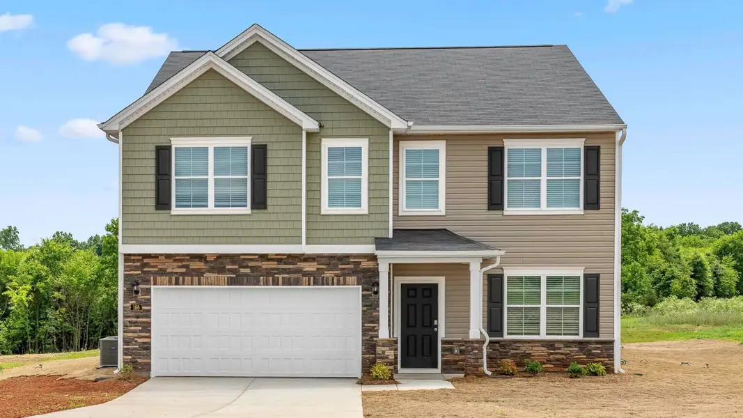 Front exterior of a new home in Brookhaven, Greensboro, NC, highlighting curb appeal (Image 1). Front exterior of a new home in Brookhaven, Greensboro, NC, highlighting curb appeal (Image 1).