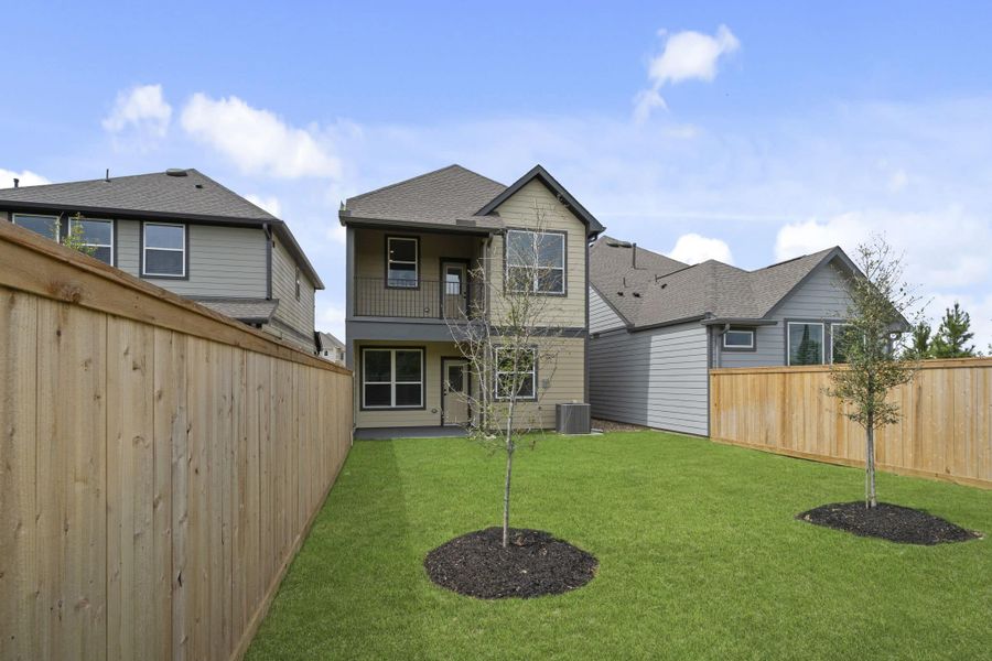 Exterior details and patio area of a home in Bridgeland, Cypress (Image 3).