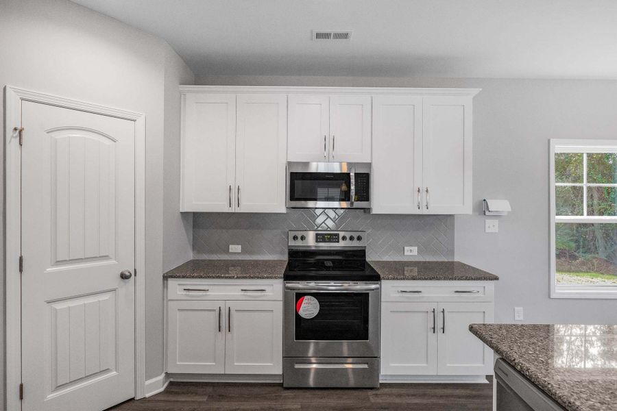 Representative furnished interior of a home built from the Springfield by Caviness & Cates Communities in Sutherland Station at Olde Liberty, Franklinton (Image 96). Representative furnished interior of a home built from the Springfield by Caviness & Cates Communities in Sutherland Station at Olde Liberty, Franklinton (Image 96).
