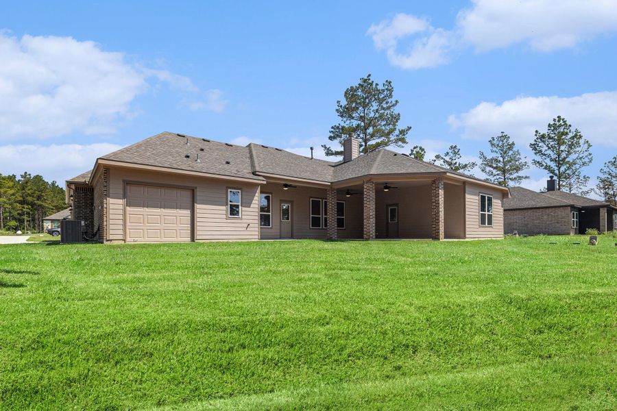 Front exterior of a new home in , Conroe, TX, highlighting curb appeal (Image 1). Front exterior of a new home in , Conroe, TX, highlighting curb appeal (Image 1).