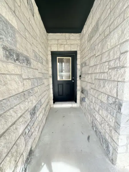 Exterior details and patio area of a home in Crosswinds, Kyle (Image 2). Exterior details and patio area of a home in Crosswinds, Kyle (Image 2).