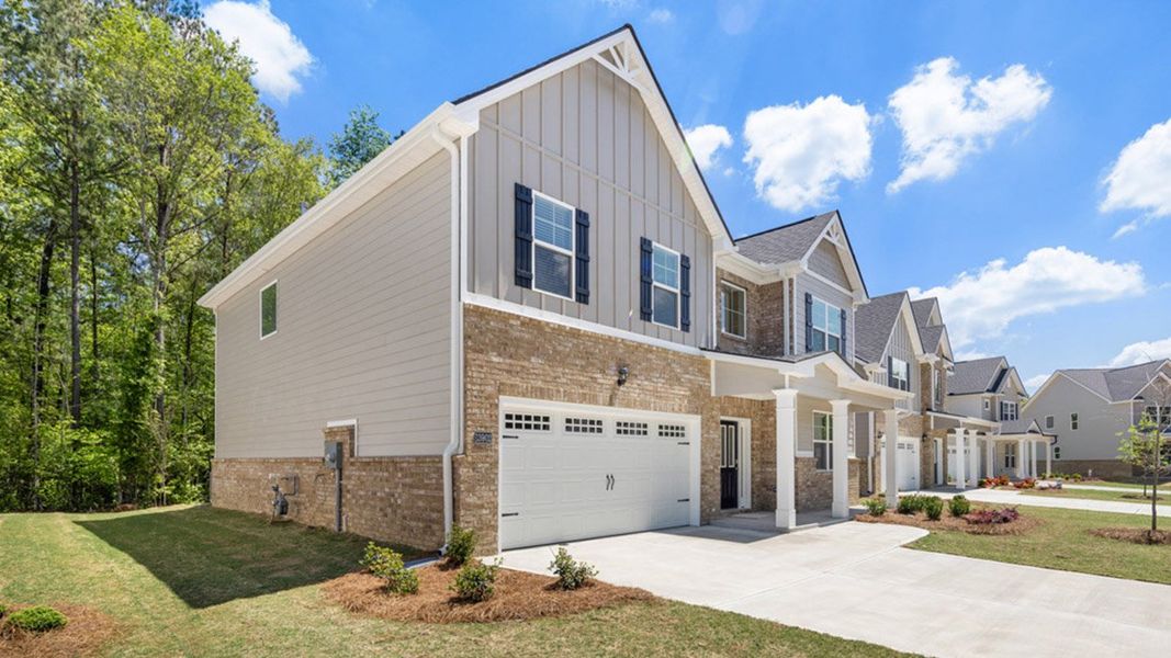 Front exterior of a new home in Wildwood, Covington, GA, highlighting curb appeal (Image 2).