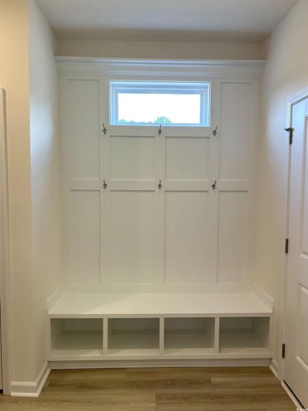 Mudroom with light wood-type flooring